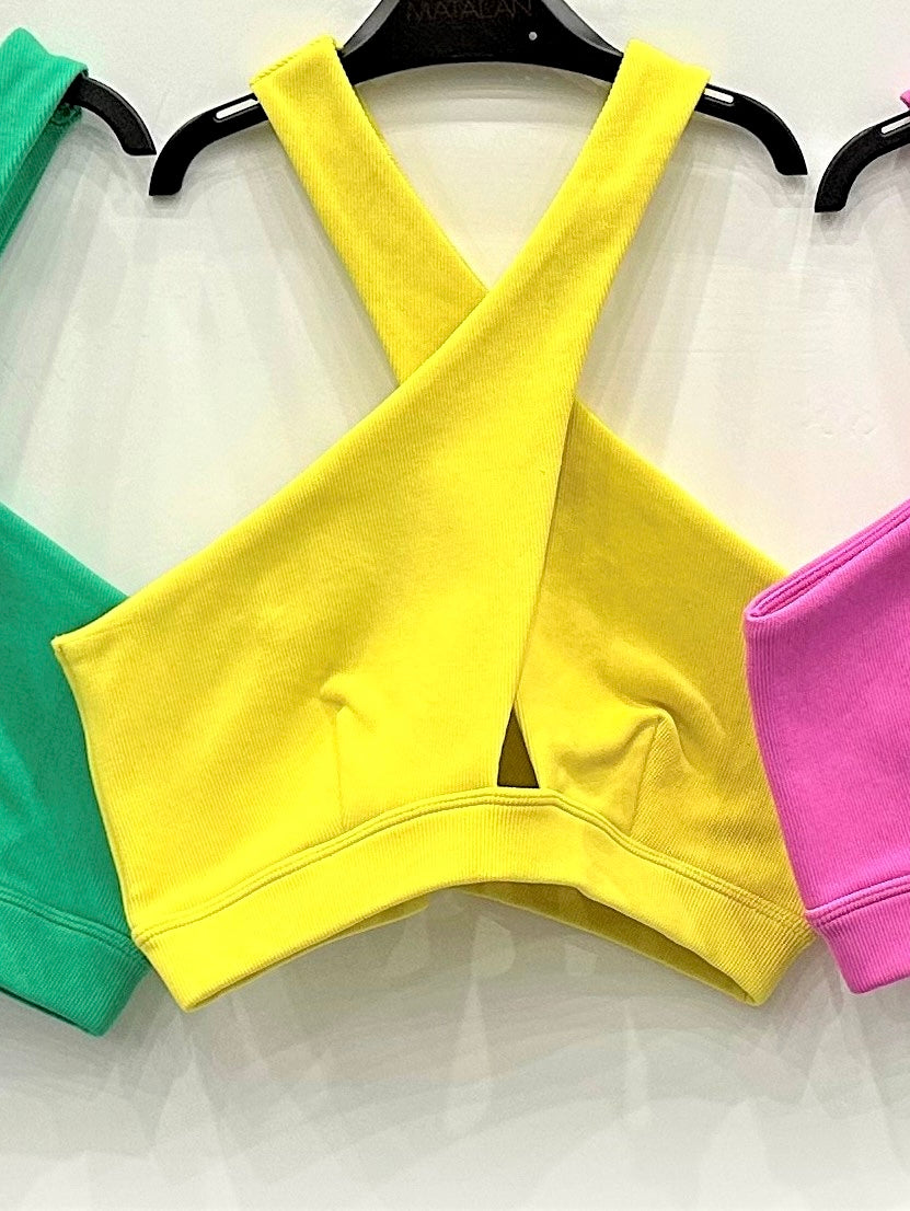 Cross braces crop top for athletic or daily wear.