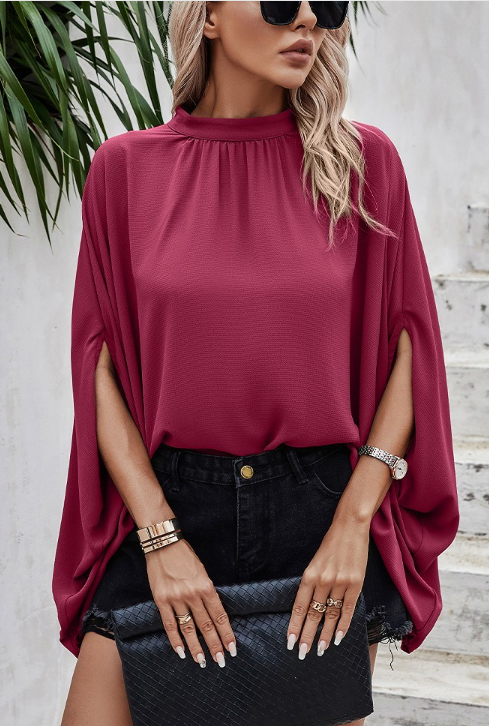 Trending color burgundy blouse.