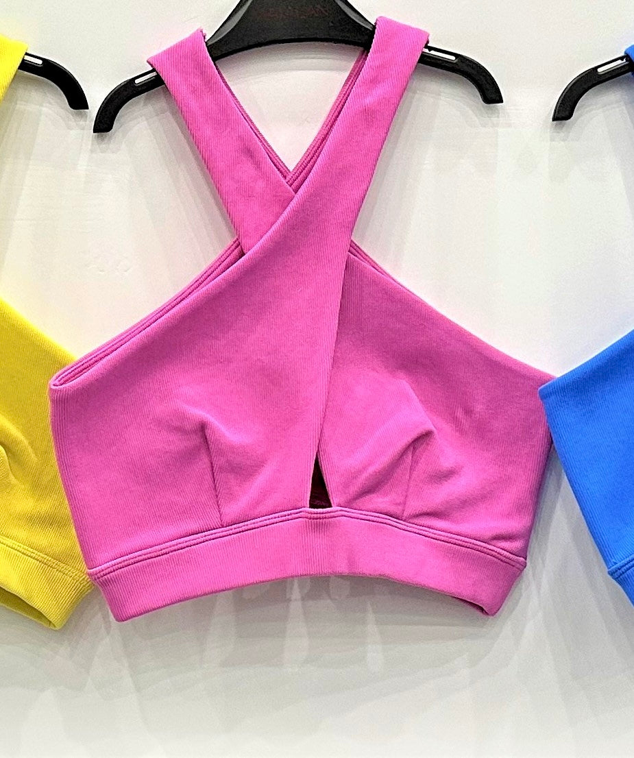 Cross braces crop top for athletic or daily wear.
