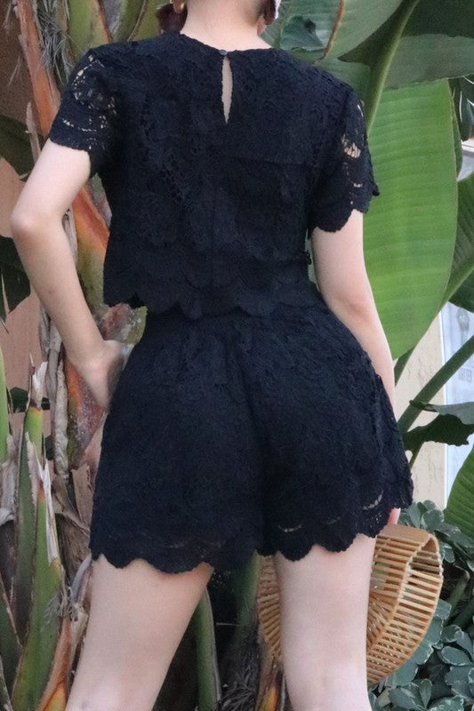 Lace shorts and blouse set for a casual but elegant look.