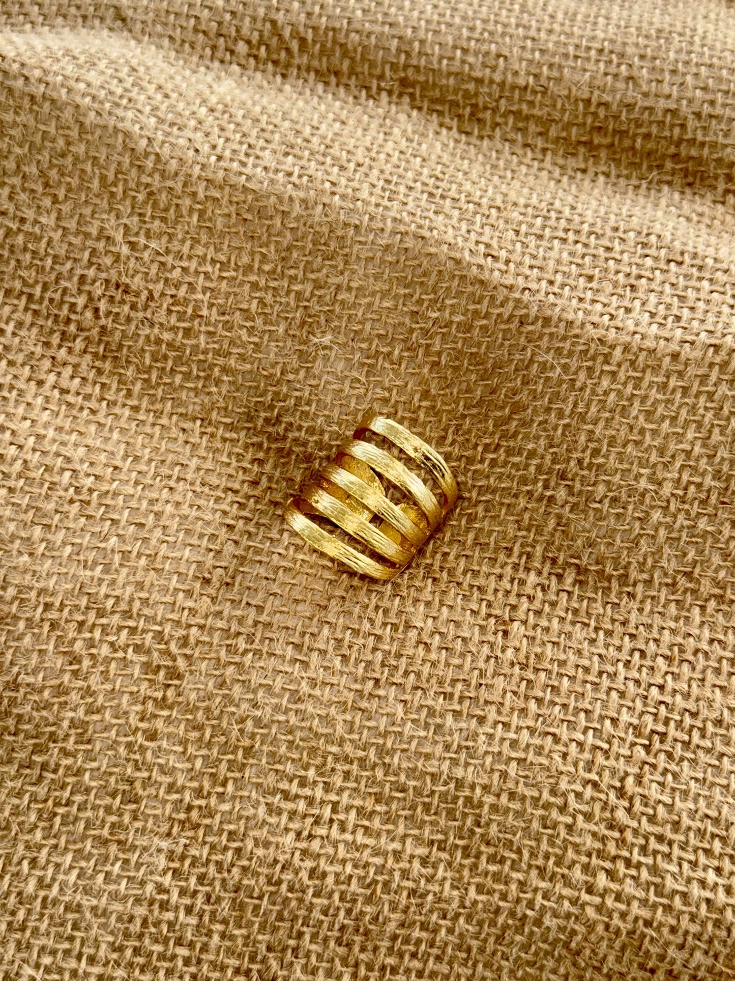 Stripes metal gold adjustable ring.