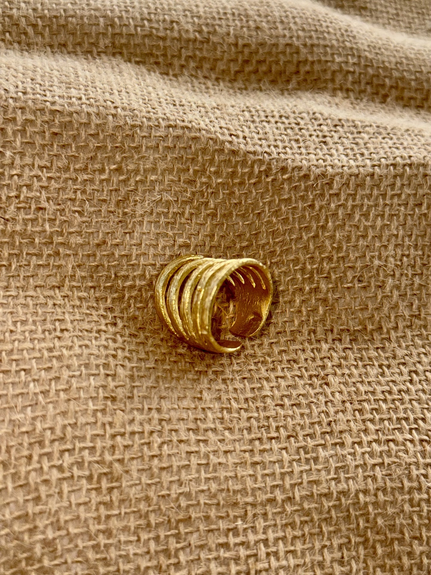 Stripes metal gold adjustable ring.