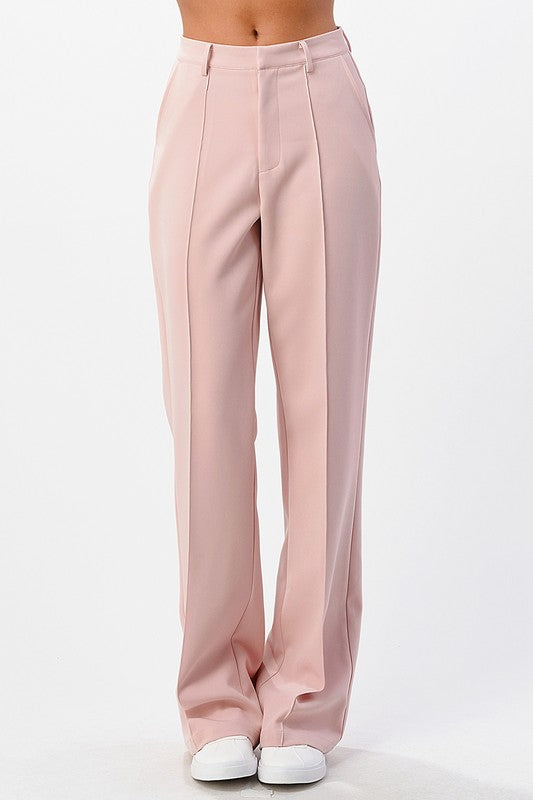Pantalón de vestir boot cut con filo y entalle perfecto.