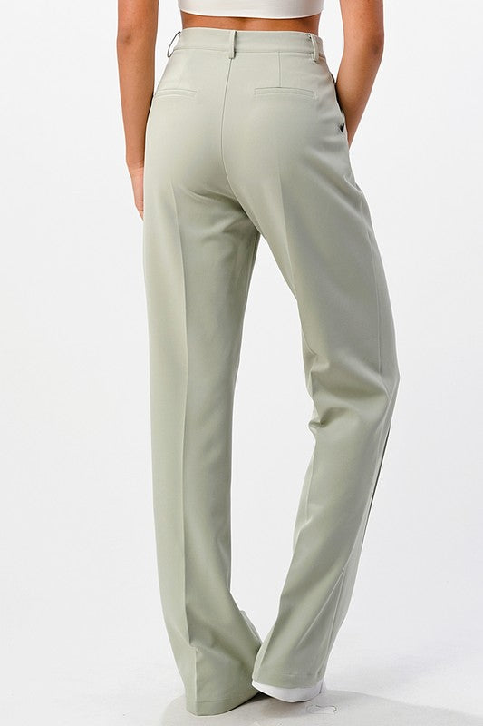 Pantalón de vestir boot cut con filo y entalle perfecto.