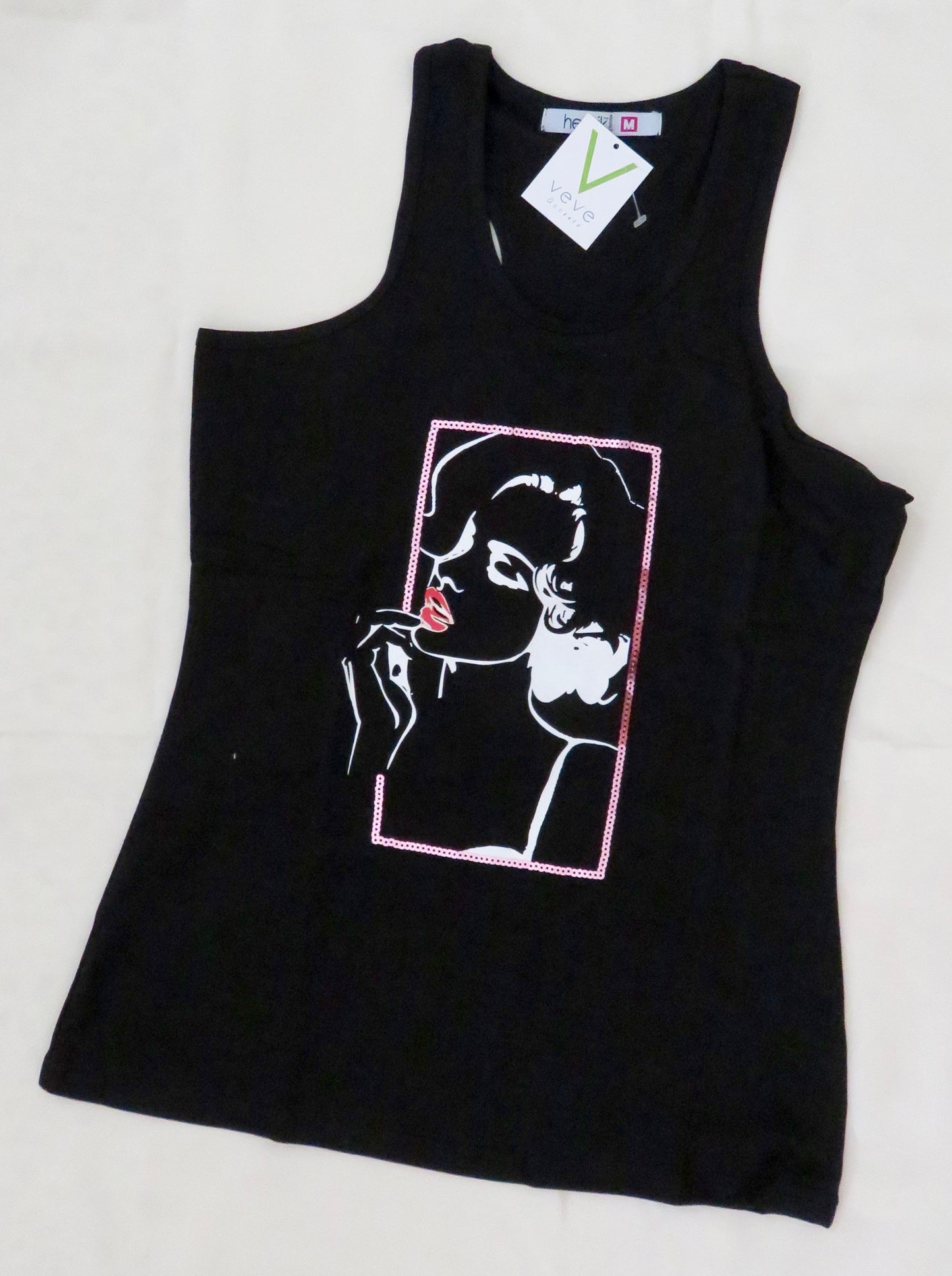 Sequins art tank top for a casual and fun look.
