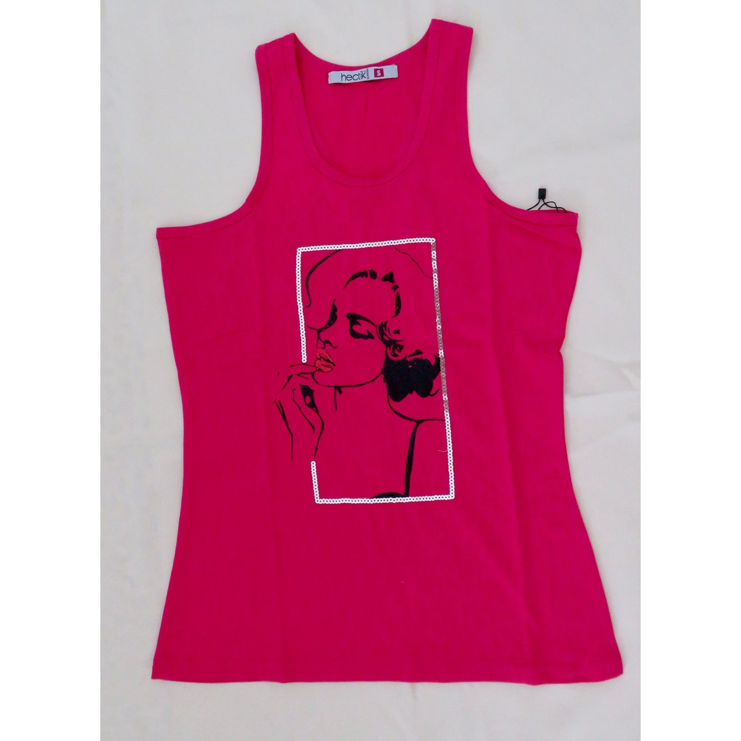 Sequins art tank top for a casual and fun look.