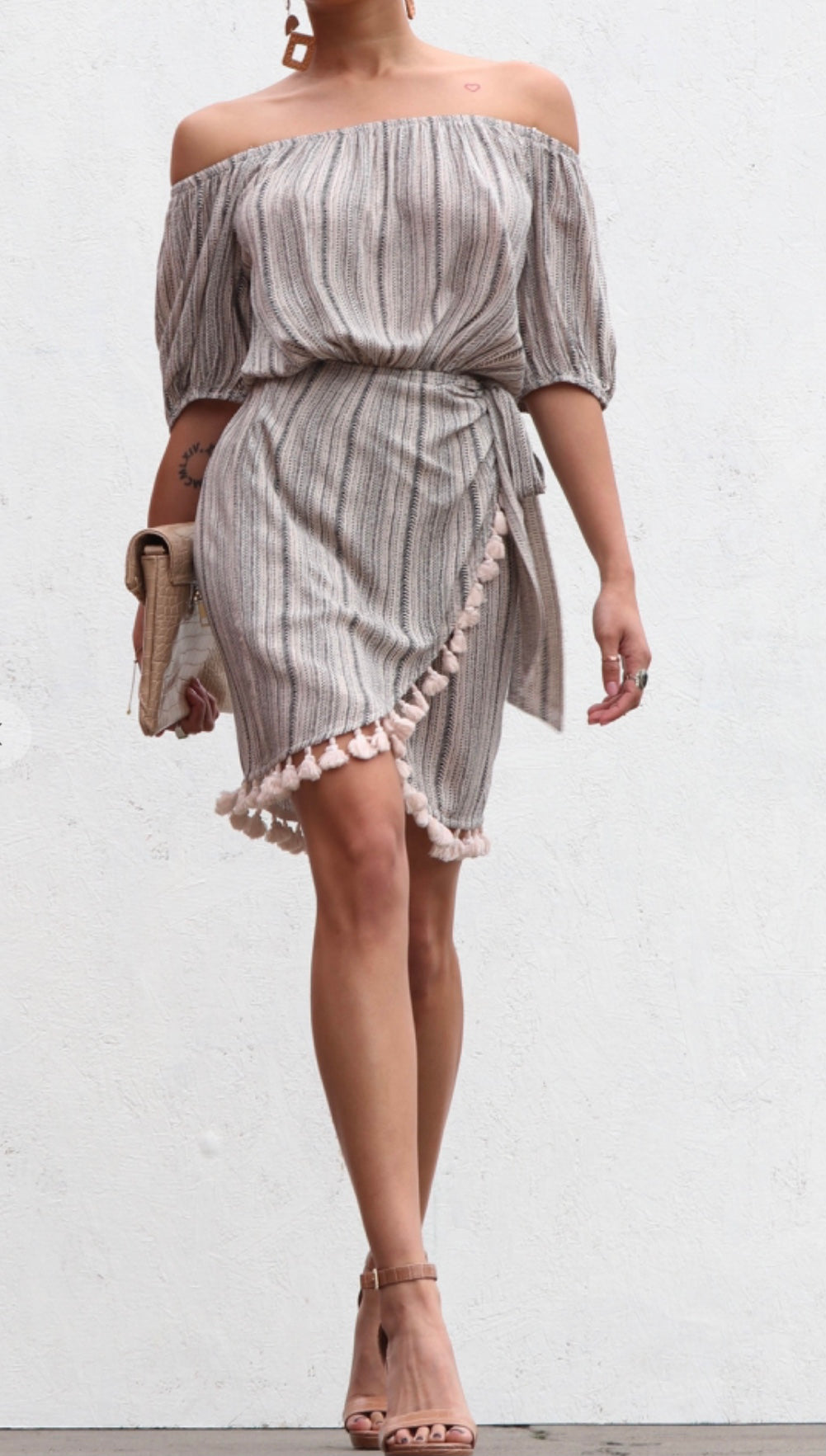 Tassels mini dress that gives you a fresh casual and beautiful look.