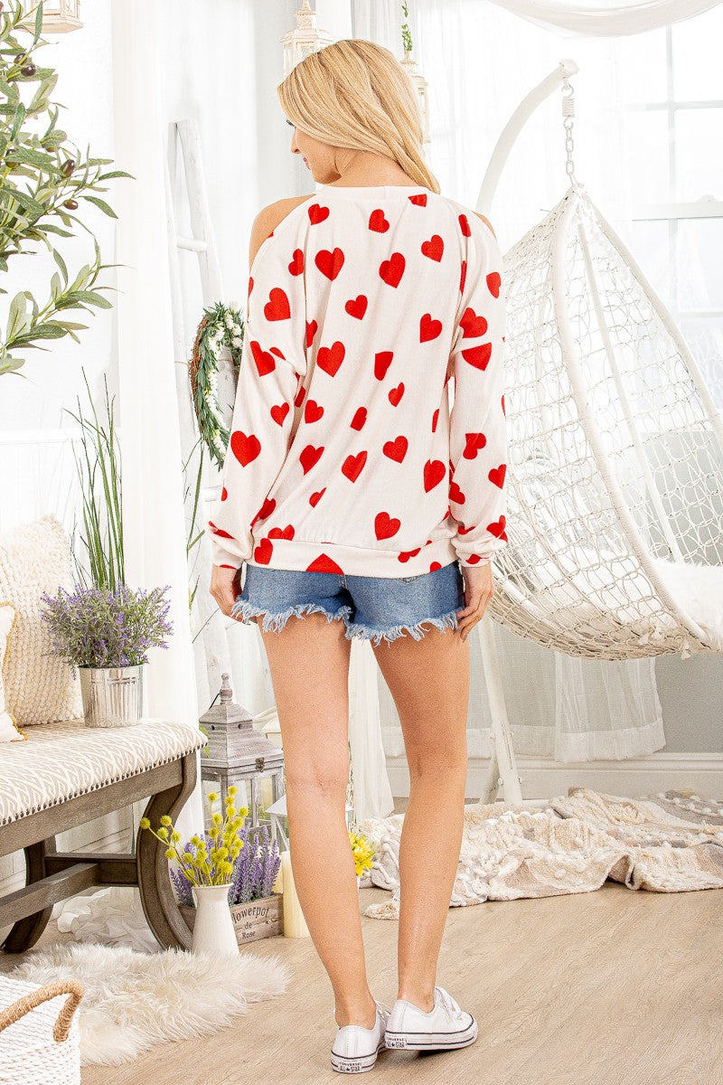 Cold shoulder hearts top, for a cozy afternoon.